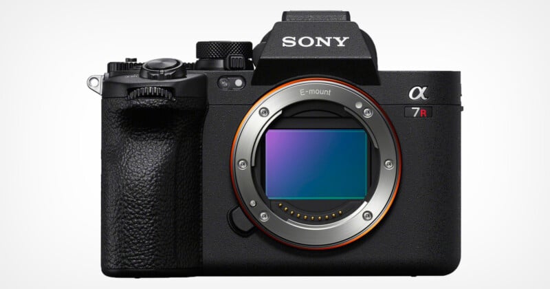A black Sony Alpha 7R IV mirrorless camera features an exposed E-mount sensor, a hard grip and a large electronic viewfinder housing, displayed against a plain white background.