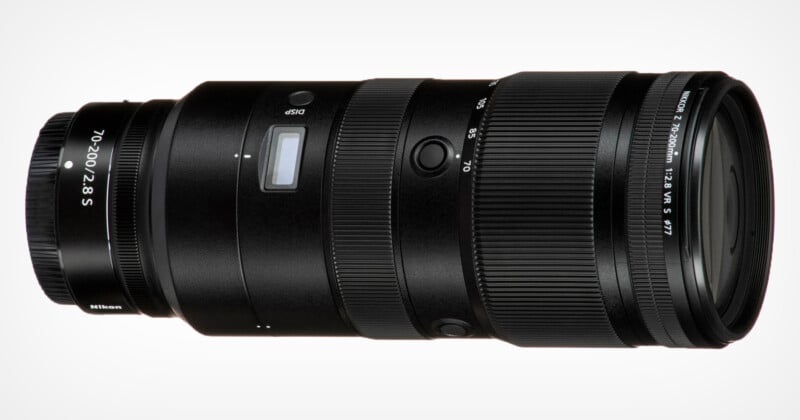A black Nikon 70-200mm f/2.8 S lens designed for Nikon Z series cameras, shown horizontally against a plain white background. The lens has various control rings and buttons for focusing and zoom adjustments.