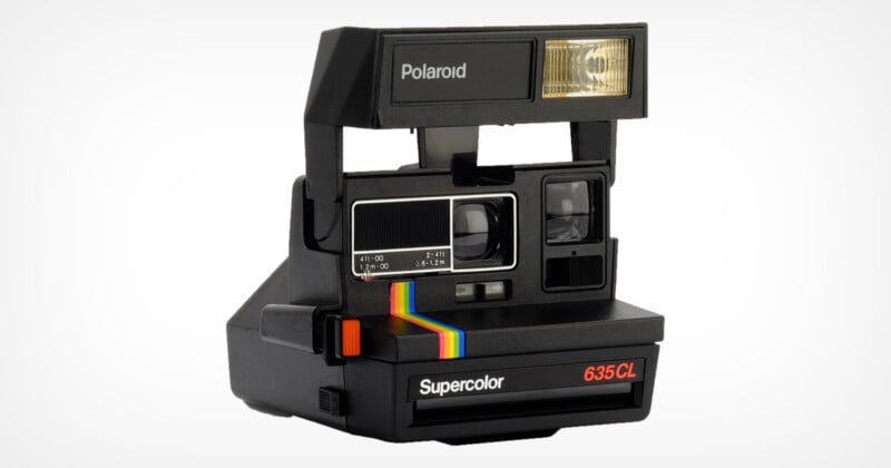 Vintage Polaroid Supercolor 635CL instant camera with rainbow stripe design. It has a built-in flash and a classic black exterior.